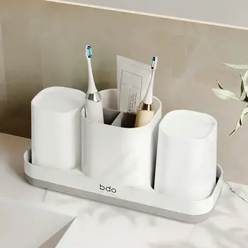 Поставка за чаши за четка за зъби Компактен и стилен държач за четка за зъби с 2 чаши, органайзер за съхранение на паста за зъби, самобръсначки